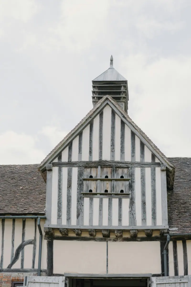 Historic timber-framed barn with dovecote gable